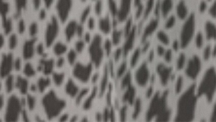 Abstract organic pattern with irregular shapes and textures in muted tones