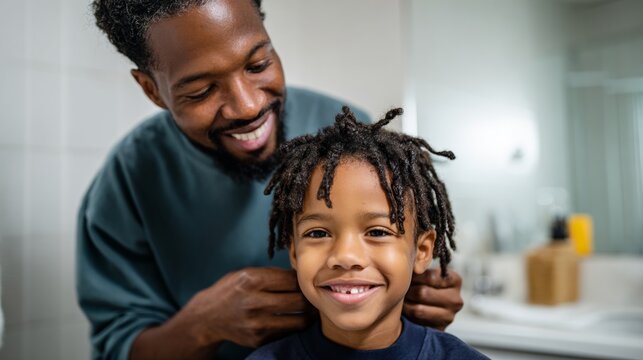 Man giving haircut to child.