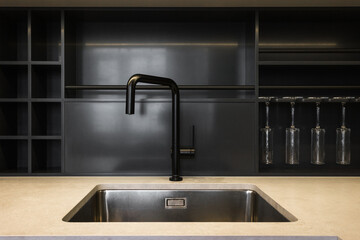 kitchen faucet on a stylish metal sink