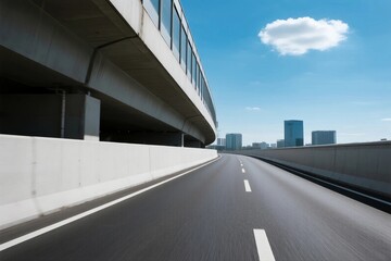Urban expressway with modern buildings under a clear blue sky