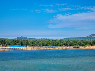 Ong Cop (Mr. Tiger) wooden bridge across Phu Ngan river in Song Cau, Phu Yen - one of the longest wooden bridges in central Vietnam - can be a shortcut to the famous Ganh Da Dia scenic spot