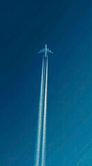 Airplane Contrails in Vivid Blue Sky