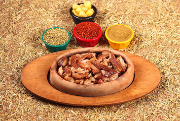 a beautiful picture of kokorech served with a lot of spices