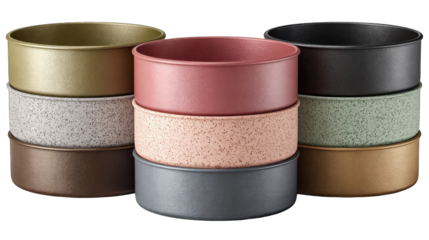 Stacked round baking pans in various muted colors