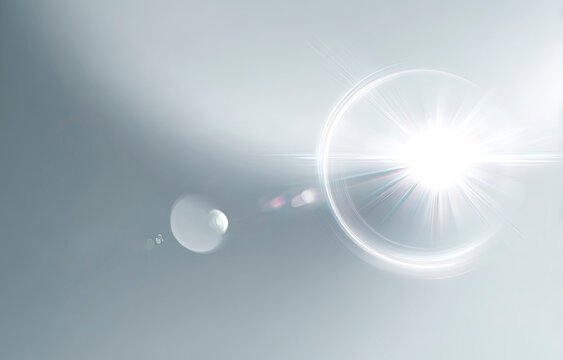 Bright white lens flare on grey background
