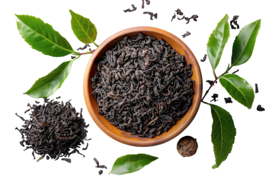 Loose leaf black tea in wooden bowl with fresh green tea leaves flat lay view on transparent background