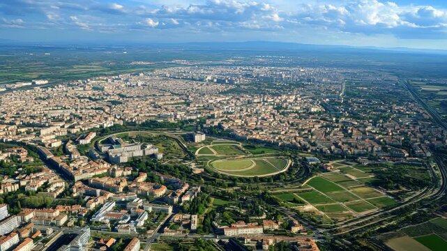 Bright aerial view showcasing Montpellier's landscape and architecture under clear blue skies, Aerial view of Montpellier in France on a sunny day in early spring