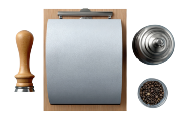 Coffee preparation tools featuring tamper paper roll and grinder for barista setup on transparent background