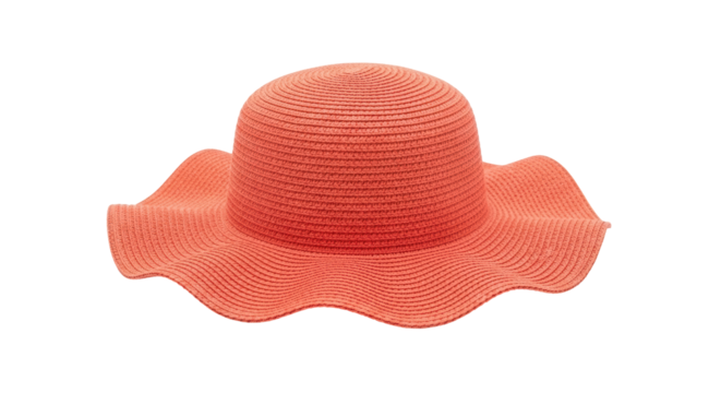 Isolated woven coral sun hat to protect from ultraviolet rays during vacation travel