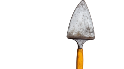 Closeup of a dirty trowel with a yellow handle isolated on transparent background, showcasing its weathered texture and the tools practical use in gardening and construction