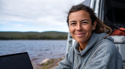 Woman enjoying outdoor adventure by lake.