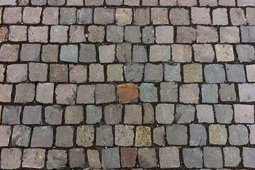 Old cobblestone pavement in the old town