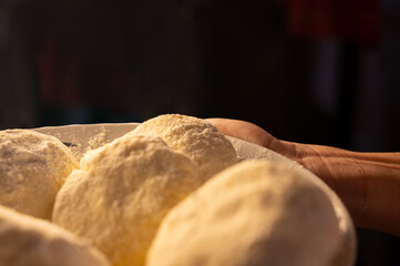 Raw Syrniki Cottage Cheese Dough on White Plate