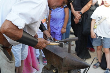 traditional blacksmith handcraft  hammering on anvil