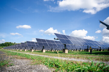 Large-scale ground-mounted solar panel installation on concrete bases, designed for efficient outdoor renewable power generation across farms, fields, and industrial sites