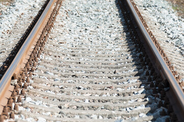 The photo shows a close-up of a railway track