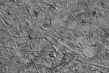 gray background, photo shows wood chip wall texture