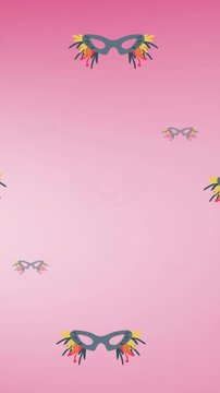 Animation of carnival mask repeated on pink backgroud