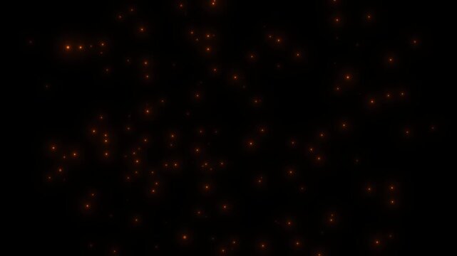 4k Flying bonfire ember sparks in the wintery night sky stock video. Bright glowing fire particles rising fast in a fiery sky with smoke. Seamless loop. Sparks on a black background. Flying bonfire