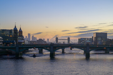 London awakens with breathtaking colors at sunrise over the Thames River