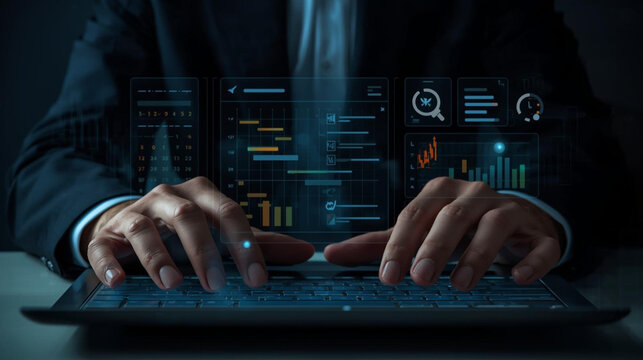 Fingers typing on a keyboard with futuristic digital data interface overlay