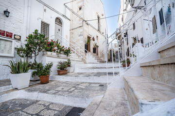 Ostuni, known as the "White City," is a charming hilltop town in Puglia, Italy, famous for its whitewashed buildings and narrow, winding streets. 