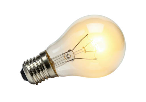 Isolated illuminated vintage tungsten filament light bulb, incandescent concept, technology