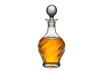Isolated clear glass decanter filled with amber-colored liquid and matching stopper on display
