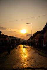 Silhouettes of people walking along the streets in Kigali, Rwanda