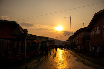Silhouettes of people walking along the streets in Kigali, Rwanda