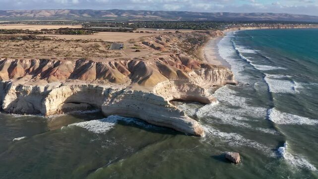 Scenic aerial of Blanche Point cliffs and surf near Port Willunga, Adelaide, South Australia