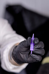 Tattoo machine needle close-up
