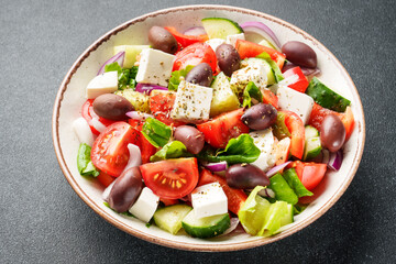 Greek salad with fresh vegetables, cheese and olive oil.