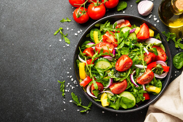 Fresh salad with leaves and vegetables.