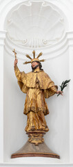 SALZBURG, AUSTIRA - SEPTEMBER 8 2025:  The carved polychrome baroque statue of St. John the Nepomuk in the church Kollegienkirche by Josef Anton Pfaffinger (cca 1719).