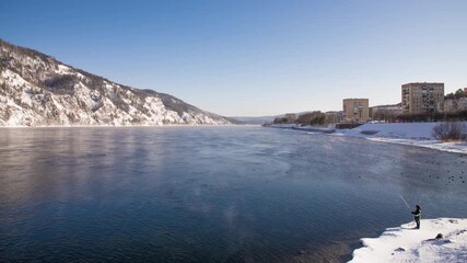 Time lapse clouds in the sunset sky moving background of the Yenisei River in the city of Krasnoyarsk, Siberia, Russia