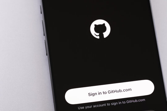 GitHub mobile logo app on a screen smartphone iPhone closeup. GitHub is the largest web service for hosting and developing IT projects. Batumi, Georgia - July 24, 2025