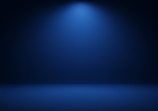Abstract dark blue background with spotlight.