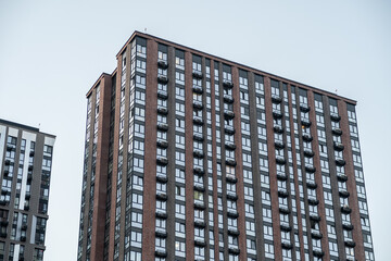 Modern Urban Apartment Building With Numerous Balconies Showcasing Architectural Design in a...