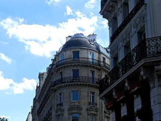 Paris, June 2025 : Visit of the magnificent city of Paris, Capital of France - View on different facades of buildings built by Baron Haussmann