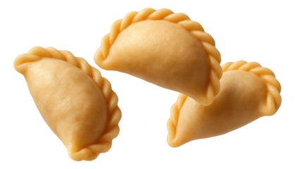 Glass carafe of peach compote with sunny yellow hue and peach slices