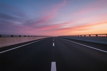 Scenic road at sunset with clear sky and empty highway