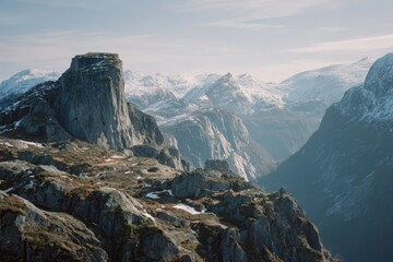 Mountain peak, rocky terrain, snow-capped peaks