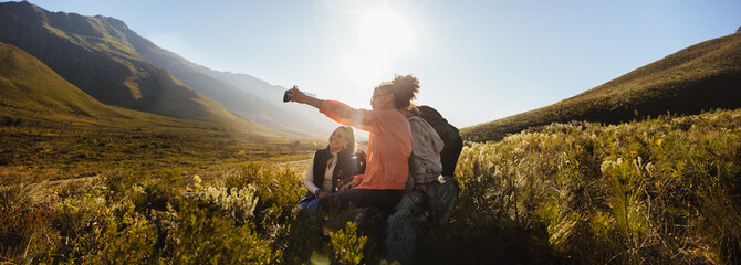 Hikers taking a photo in nature