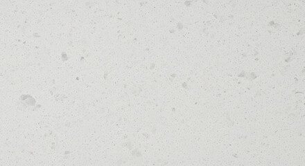 Obraz premium Speckled Off White Textured Surface with Subtle Variation in Color and Light Creates a Neutral Yet Rich Background Suitable for Various Design Applications