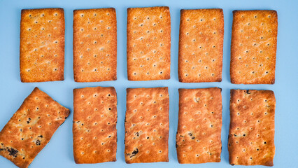 Flat lay view of biscuit on light blue background