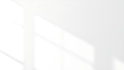 Minimalist white textured wall with subtle shadows and negative space