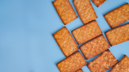 Flat lay view of biscuit on light blue background