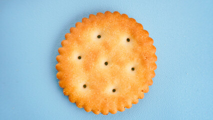 Flat lay view of biscuit on light blue background