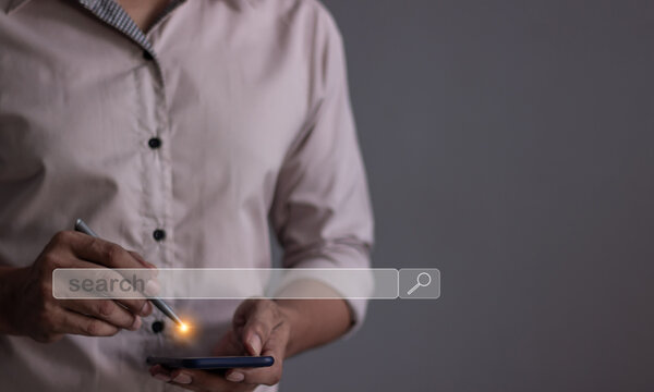 Young man with smartphone mobile hand using a pen touching to search bar, Search job - Powered by Adobe